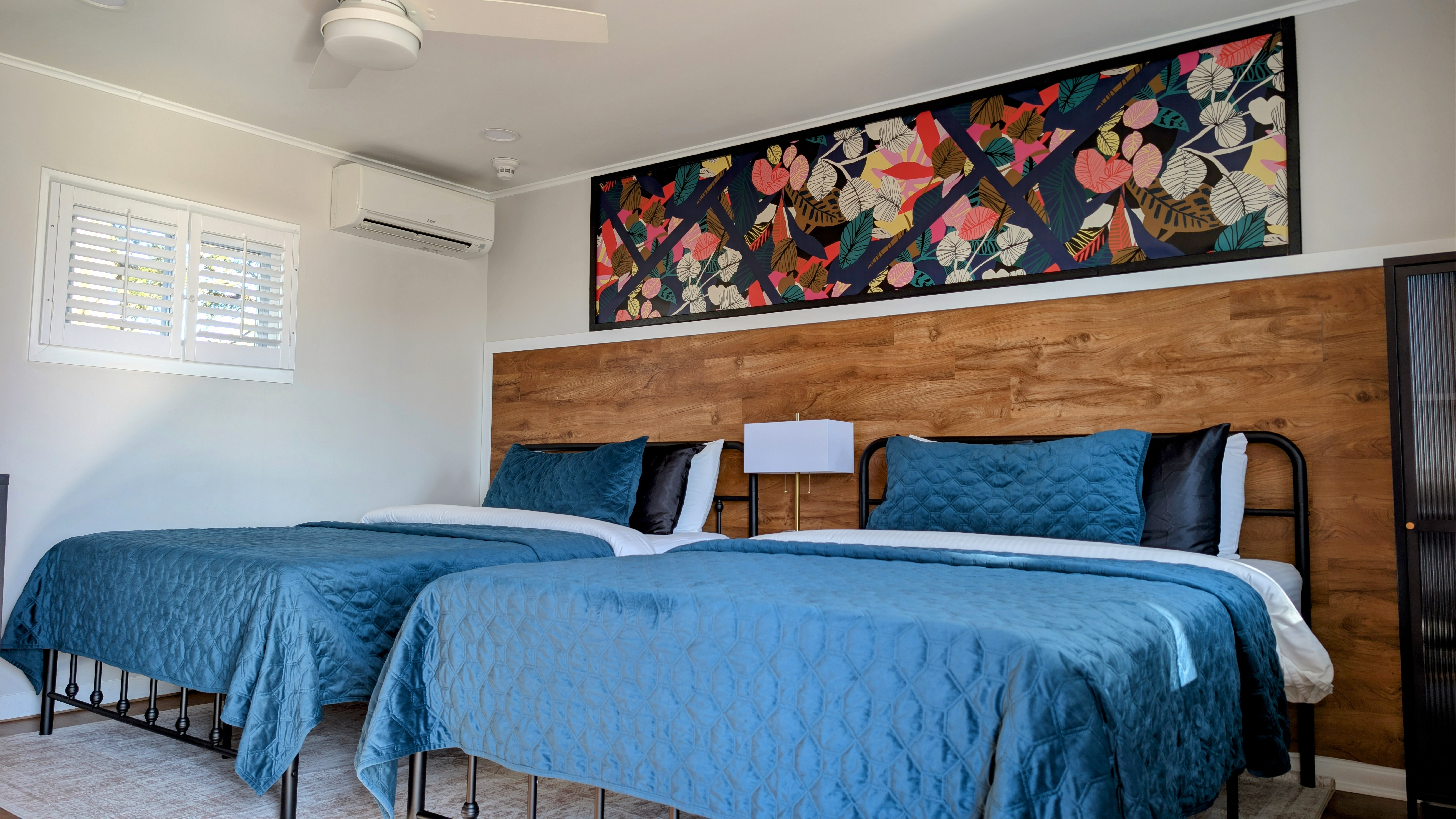 Two Full Bed Kitchenette room in Indigo Blue style at Ocean View Terrace Inn